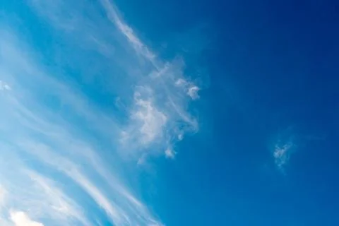 White clouds against a blue sky Stock Photos