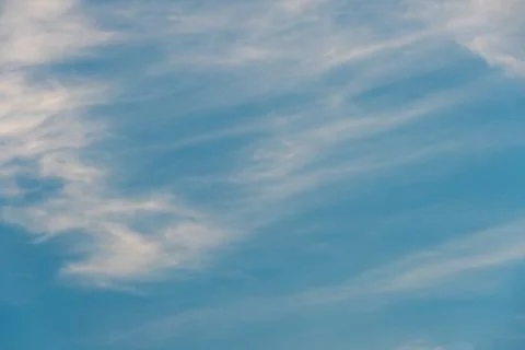 White clouds against a blue sky Stock Photos