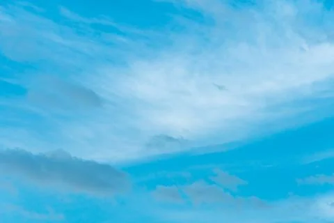 White clouds against a blue sky Stock Photos