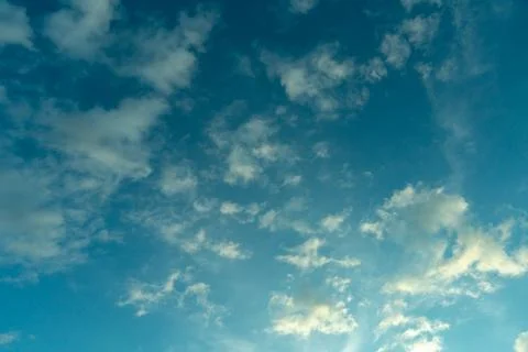 White clouds against a blue sky Stock Photos