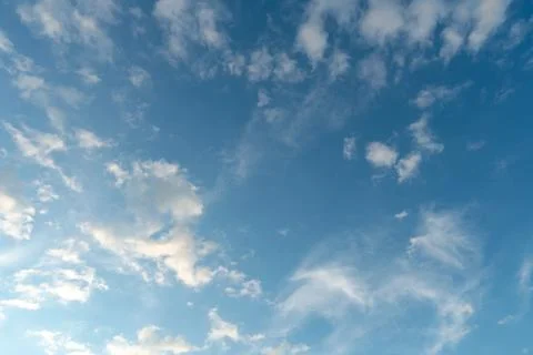 White clouds against a blue sky Stock Photos
