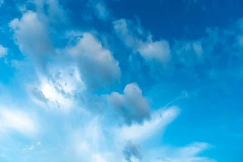 White clouds against a blue sky Stock Photos