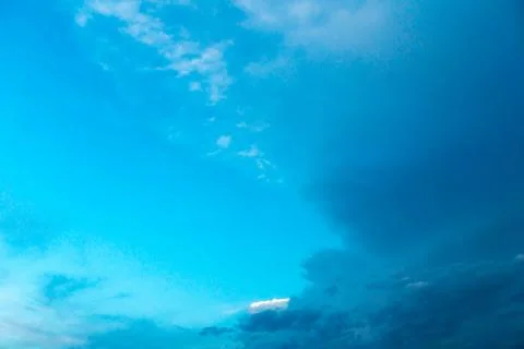 White clouds against a blue sky Stock Photos