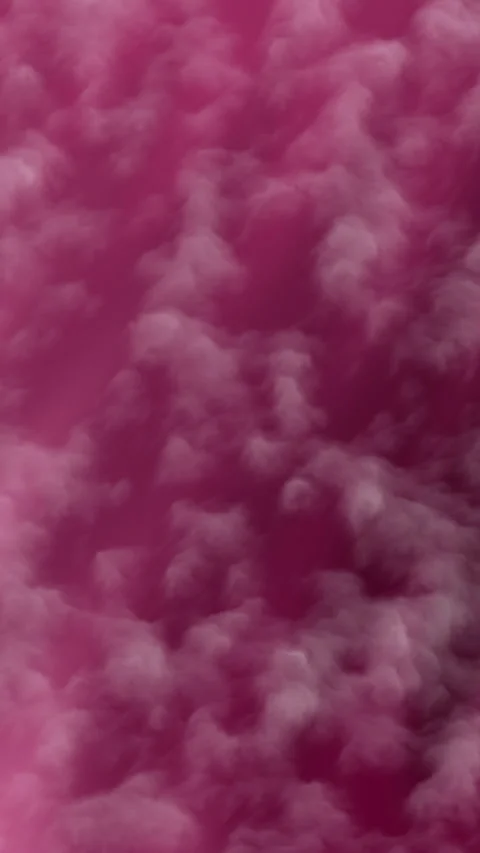 White clouds against a pink sky for peaceful background Stock Footage 309992457