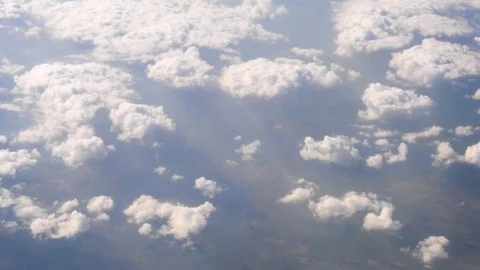 White Clouds and Blue Sky through the flight window, India, Southeast, Asia Stock Footage 77415914