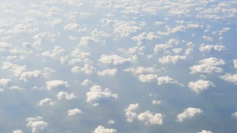 White Clouds and Blue Sky through the flight window, India, Southeast, Asia Stock Footage 77415917