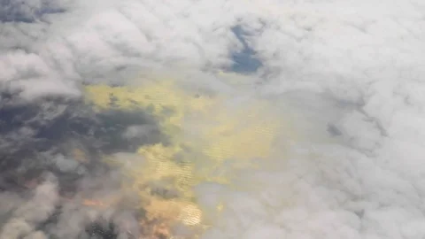 White Clouds and Blue Sky through the flight window, India, Southeast, Asia Stock Footage 77415946