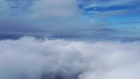 White clouds and blue sky drone pan clip Stock Footage 145799271