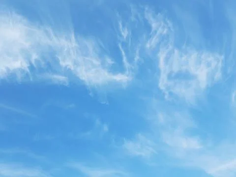 White clouds and the blue sky Stock Photos