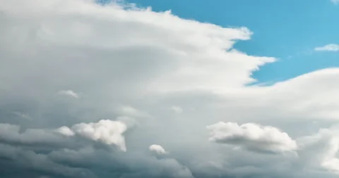 White clouds and rain clouds forms and moving in the sky timelapse Stock Footage 161323231