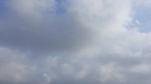 White Clouds are flying across the blue sky. Timelapse Stock-Footage 333693900