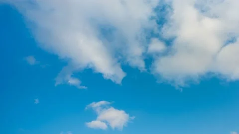 White clouds are moving slowly. time lapse. Stock Footage 145889751