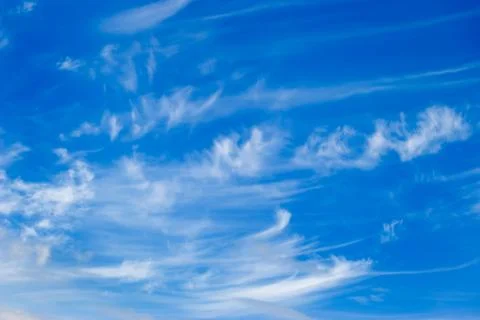 	White clouds on a background of the blue sky Stock Photos
