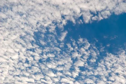 	White clouds on a background of the blue sky Stock Photos