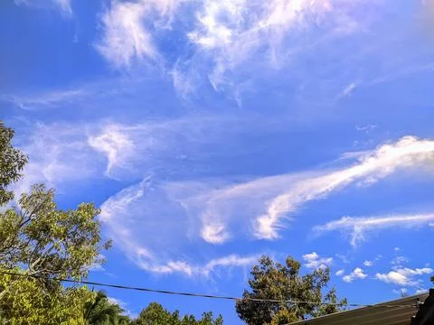 White clouds on a beautiful blue background Stock Photos