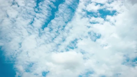 White clouds on beautiful blue sky timelapse Stock Footage 131367070