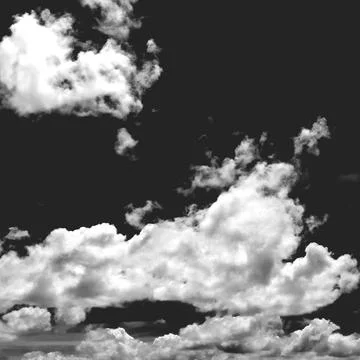 White clouds on a black background, monochrome image of clouds Foto stock