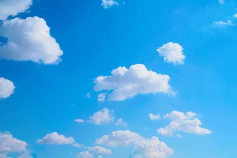 White clouds on blue background Stock Photos