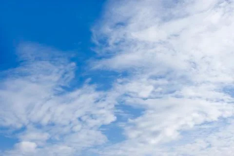 White clouds on the blue Stock Photos