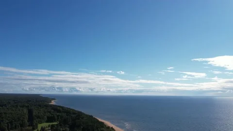 White clouds, blue sky and sea. Aerial view Stock Footage 207662549