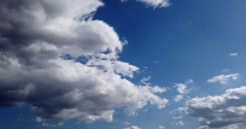 White clouds with blue sky background timelaps footage Stock Footage 125523971