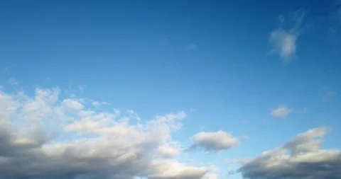 White clouds with blue sky background timelaps footage Stock Footage 125529504