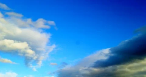 White clouds with blue sky background timelaps footage Stock Footage 125645247