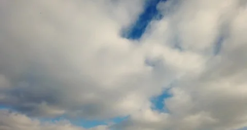 White clouds with blue sky background timelaps footage Stock Footage 125646375
