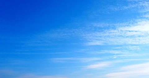 White clouds with blue sky background timelaps footage Stock Footage 125649943