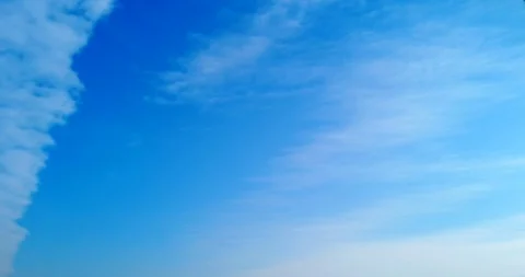 White clouds with blue sky background timelaps footage Stock Footage 125650235