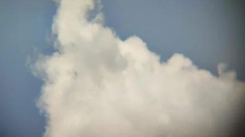 White clouds on a blue sky background Stock Footage 323215631