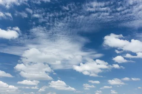 White clouds in the blue sky background Stock Photos