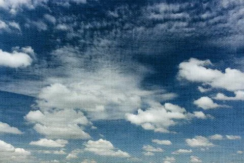 White clouds in the blue sky background, fabric layer Stock Photos