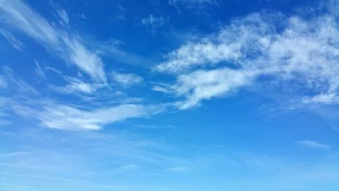 White clouds on the blue sky background. Panoramic photo Foto stock