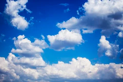 White clouds on blue sky background Stock Photos