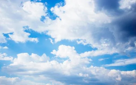 White clouds on blue sky background Stock Photos
