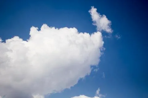 White clouds on blue sky background Stock Photos