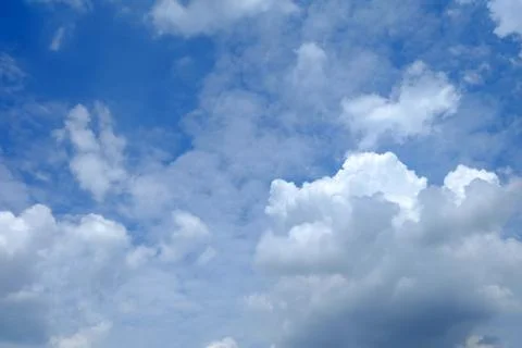 White Clouds with Blue Sky Background. Stock Photos