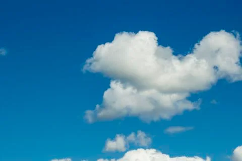 White clouds on blue sky background Stock Photos