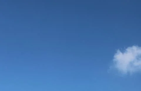 White clouds on the blue sky background Stock Photos