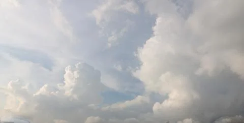 White clouds on the blue sky background Stock Photos