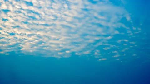 White clouds with blue sky in background, clouds in horizon blue sky Stock Photos