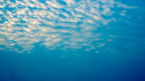 White clouds with blue sky in background, clouds in horizon blue sky Stock Photos