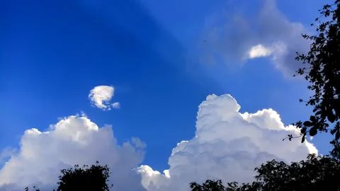 White clouds with blue sky in background, clouds in horizon blue sky Stock Photos