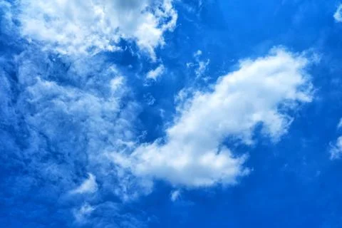 White Clouds with Blue Sky Background. Stock Photos