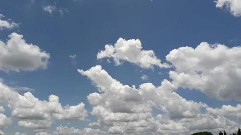White clouds with blue sky background Stock Photos