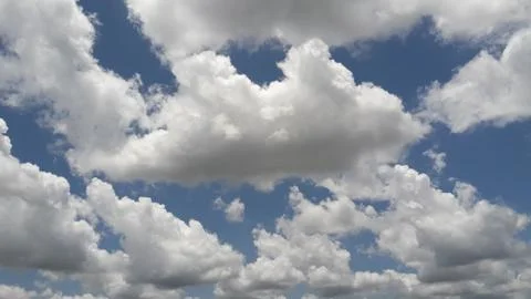White clouds with blue sky background Stock Photos