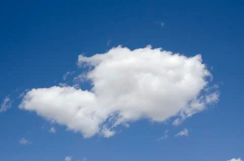 White clouds on a blue sky. Background. Stock Photos