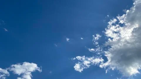 White clouds on a blue sky background Stock Photos