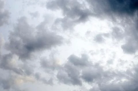 White clouds on a blue sky. Background. Stock Photos